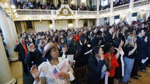 Immigrants taking oath of citizenship